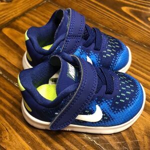 NWOT Nike Royal Blue and White Velcro Sneakers.